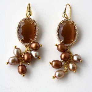 Earrings with an amber crystal, swarovski and champagne and bronze freshwater pearls.  18kt gold plated silver hook.